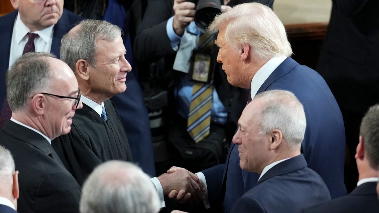 President Donald Trump greets Chief Justice John Roberts at his address to a joint session of Congress at the Capitol in Washington, March 4, 2025. If tradition holds, members of the Supreme Court will attend Trump’s annual speech, just days after ruling against the legality of his tariffs. (Doug Mills/The New York Times)
