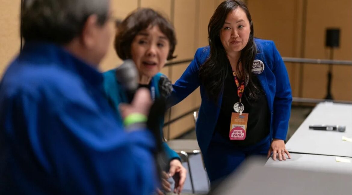 Sacramento City Councilmember Mai Vang, a candidate for California’s 7th Congressional District, right, and U.S. Rep. Doris Matsui, center, attend a caucus meet during the California Democratic Party convention at Moscone West in San Francisco on Feb. 21, 2026. Photo by Jungho Kim for CalMatters