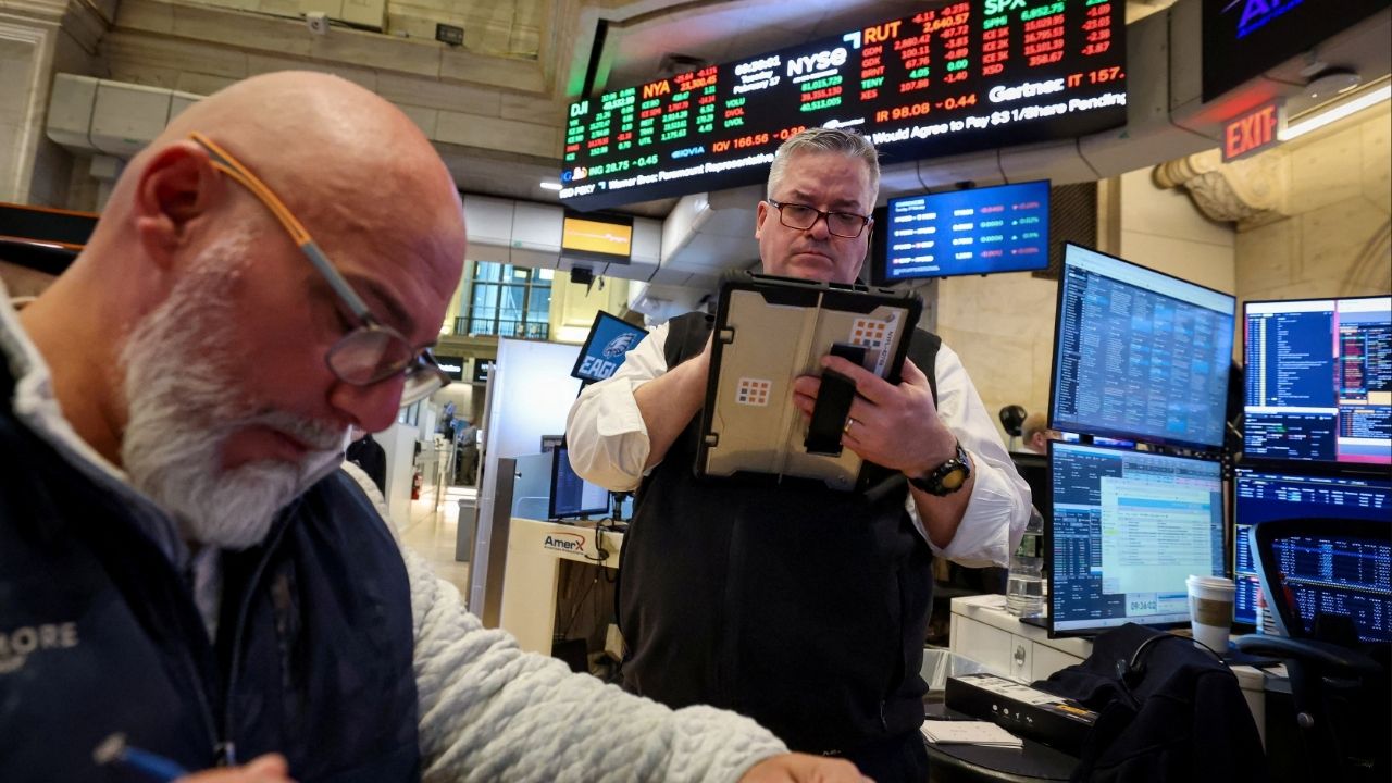 Traders work on the floor at the New York Stock Exchange (NYSE) in New York City, U.S., February 17, 2026. (Reuters/Brendan McDermid)
