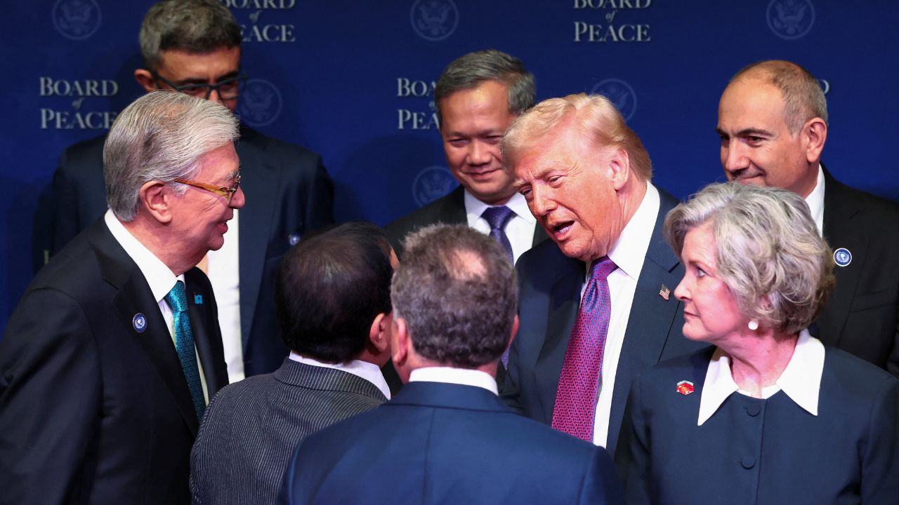 U.S President Donald Trump talks with world leaders participating in the inaugural Board of Peace meeting at the U.S. Institute of Peace in Washington, D.C., U.S., February 19, 2026. (Reuters/Kevin Lamarque)