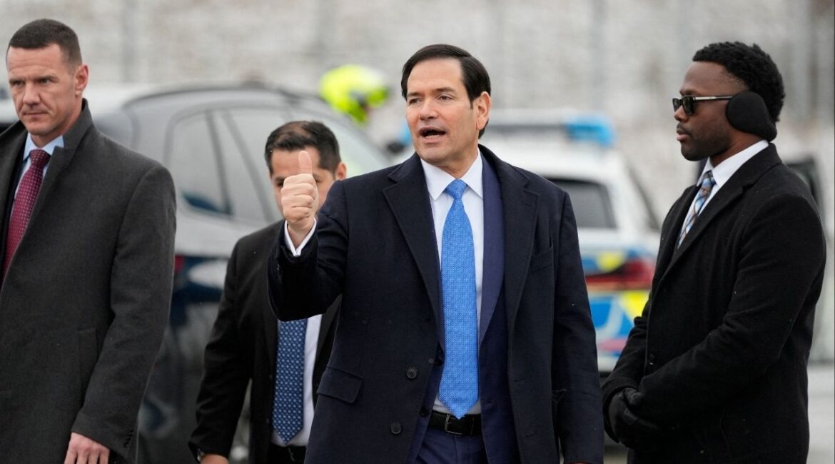 U.S. Secretary of State Marco Rubio gives a thumbs up as he departs Munich International Airport in Munich, Germany, Sunday, Feb. 15, 2026, after attending the Munich Security Conference. (Alex Brandon/Pool via Reuters)