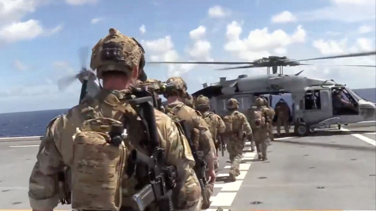 U.S. forces prepare to board the vessel Veronica III, which tried to defy U.S. President Donald Trump's quarantine, according to the U.S. Department of Defense, in what the department said is the INDOPACOM area of responsibility, in this screengrab obtained from a handout video released on February 15, 2026. (Department of War via X/Handout via Reuters)
