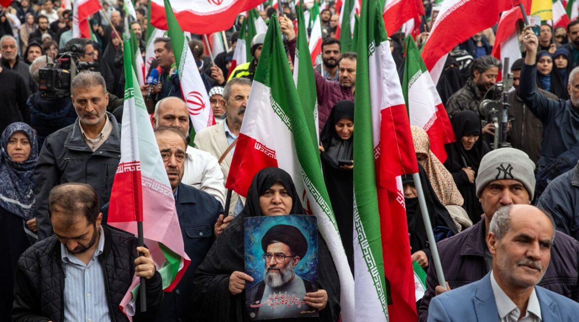 Image of Iranians protesting the US-Israeli missile strikes on Iran