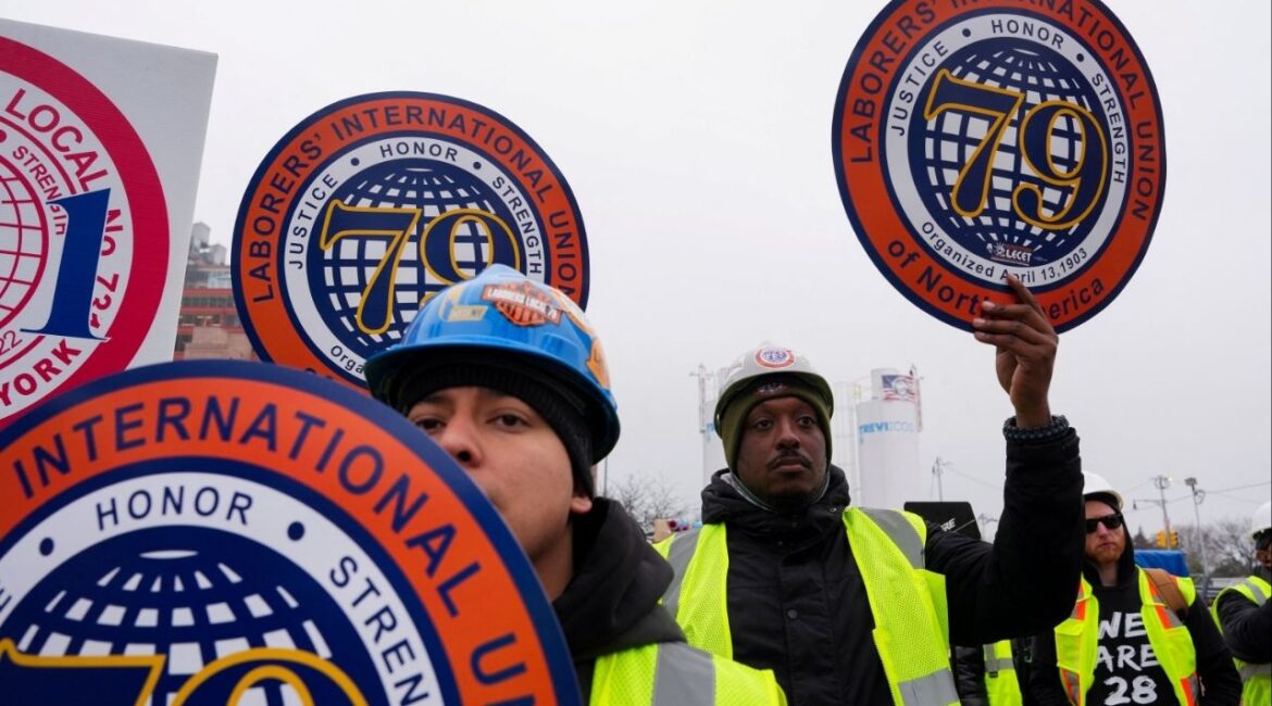 Union members watch as New York Governor Kathy Hochul addresses gateway project construction workers at the site of the Gateway Project in New York City, U.S., February 17, 2026. (Reuters/Adam Gray)