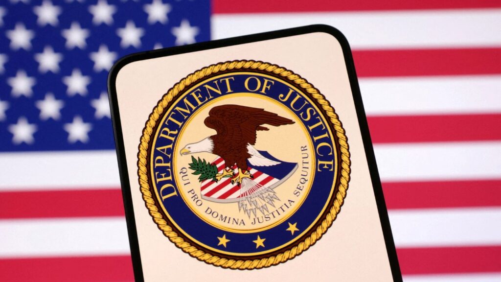 United States Department of Justice logo and U.S. flag are seen in this illustration taken April 23, 2025. REUTERS/Dado Ruvic/Illustration/File Photo