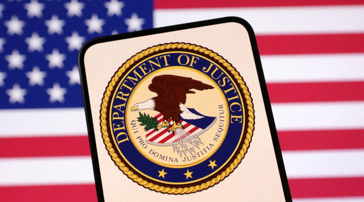 United States Department of Justice logo and U.S. flag are seen in this illustration taken April 23, 2025. REUTERS/Dado Ruvic/Illustration/File Photo
