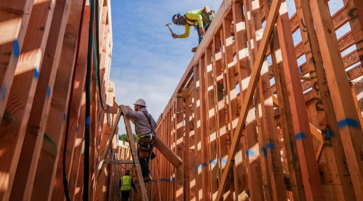 Image of framed walls going up for affordable housing in California