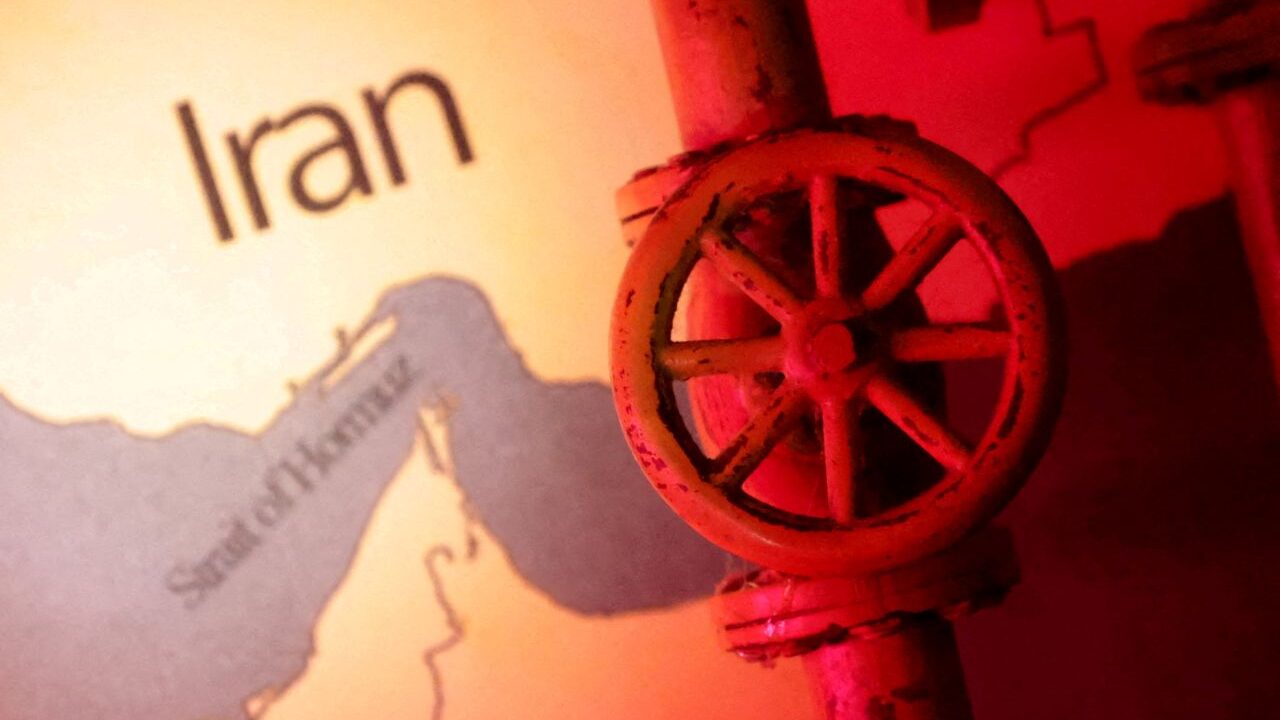 Composite image of the Strait of Hormuz and an oil spigot