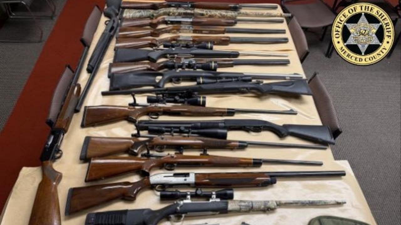 A Merced County man was arrested after allegedly threatening a 68-year-old man with a handgun and using racial slurs during a property dispute in South Dos Palos, where deputies later seized 28 firearms from his home. (Merced County SO)