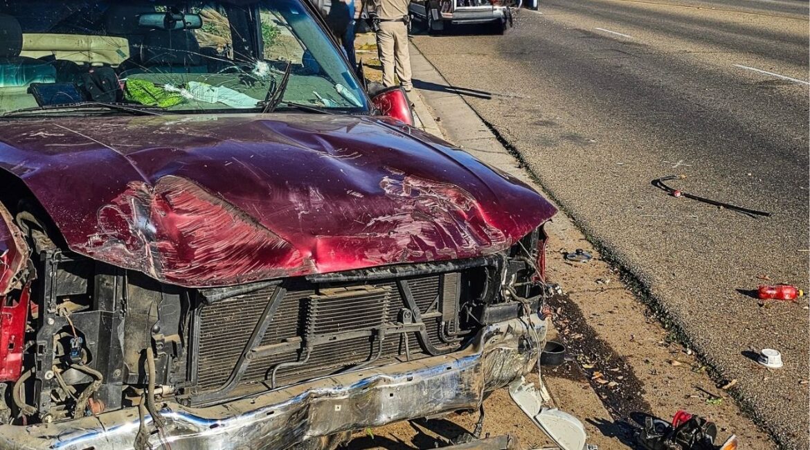 A driver traveling at high speeds on Clinton Avenue in Fresno lost control and crashed through two fences and a parked vehicle, with no serious injuries reported, according to the California Highway Patrol. (CHP)
