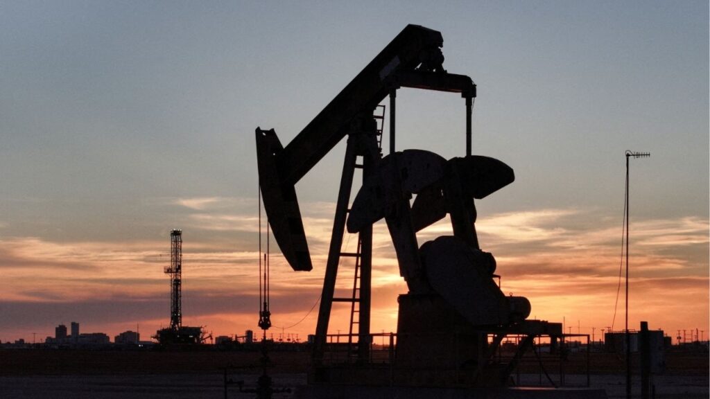 A drone view of a pump jack and drilling rig south of Midland, Texas, U.S. June 11, 2025. (Reuters File)