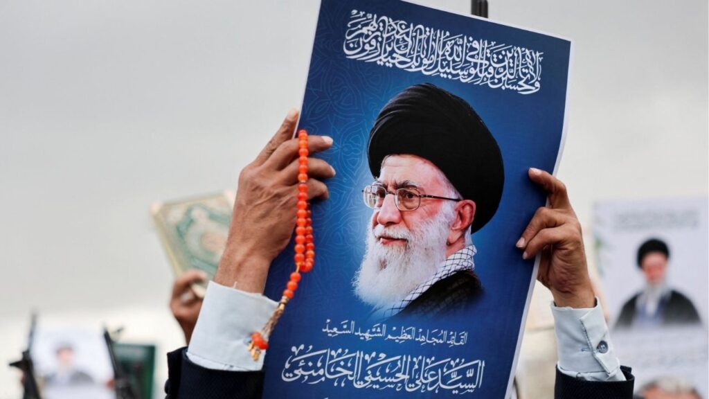 A man holds a poster featuring a picture of late Iran's Supreme Leader Ayatollah Ali Khamenei during a demonstration by Houthi supporters in solidarity with Iran and Lebanon, amid the U.S.-Israeli conflict with Iran, in Sanaa, Yemen March 6, 2026. (Reuters/Khaled Abdullah)