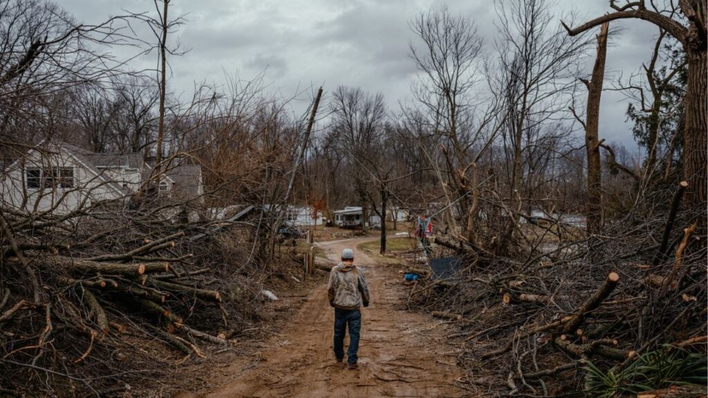 A man walks down a road searching for a friend who had not been heard from in Union City, Mich. on Saturday, March 7, 2026 after a tornado swept through overnight. More severe storms are expected across a large section of the United States this week, with forecasters warning they could deliver all manner of severe weather — including large hail, damaging winds, tornadoes and flooding — anywhere from the southern Plains through the Midwest and into the Northeast. (Jamie Kelter Davis/The New York Times)