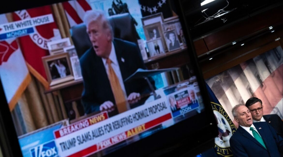 A monitor displays television news coverage of President Donald Trump’s remarks on NATO and the war with Iran as House Majority Leader Steve Scalise (R-La.) speaks to reporters on Capitol Hill on Tuesday, March 17, 2026. Looking on at right is House Speaker Mike Johnson (R-La.). Trump told reporters at the White House on Tuesday that he is not afraid to put U.S. troops on the ground in Iran, and that the United States does not “need or desire” any help from U.S. allies to open the Strait of Hormuz. (Nathan Howard/The New York Times)