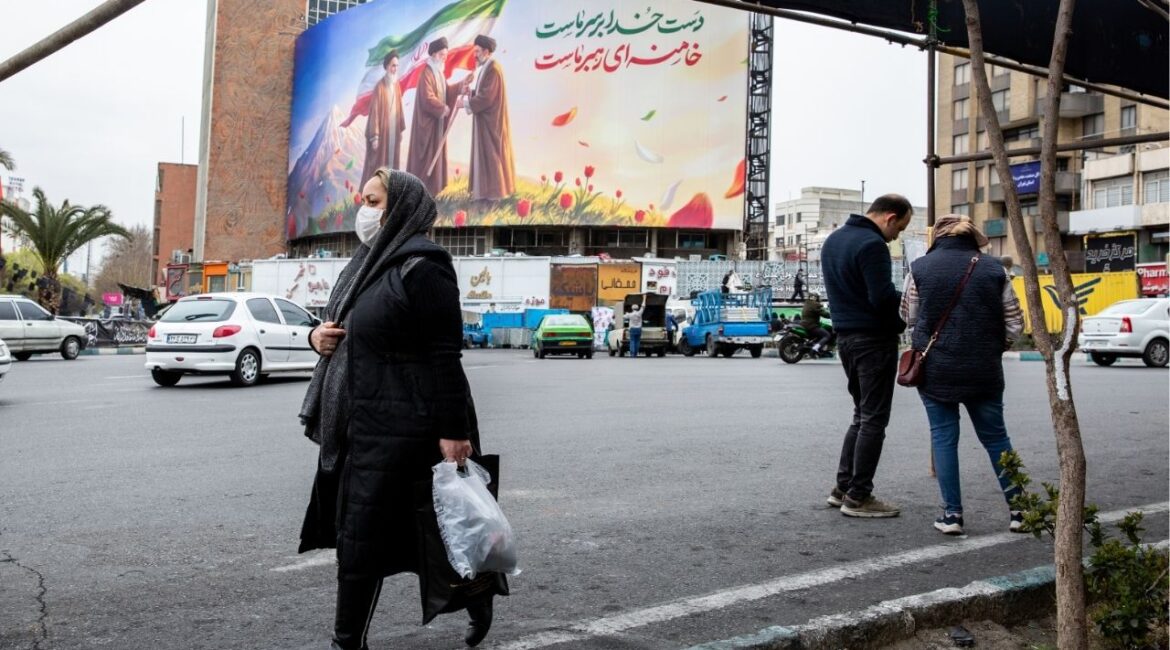 A new billboard at Valiasr square in Tehran shows the late Ruhollah Khomeini, left, looking on as the late Ayatollah Ali Khamenei, center, passes an Iranian flag to to his son, Mojtaba Khamenei, now chosen as Iran’s new supreme leader, on Tuesday, March 10, 2026. When U.S.-Israeli bombing began overnight in Tehran, some residents described the strikes as among the worst they had experienced since the war started. (Arash Khamooshi/The New York Times)
