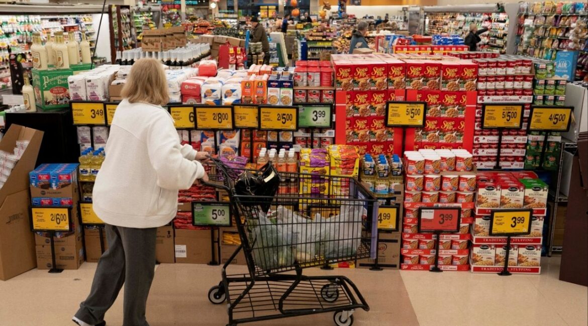 A shopper browses a food display while shopping for groceries at an Albertsons supermarket in Redmond, Washington, U.S., November 24, 2025. (Reuters File)