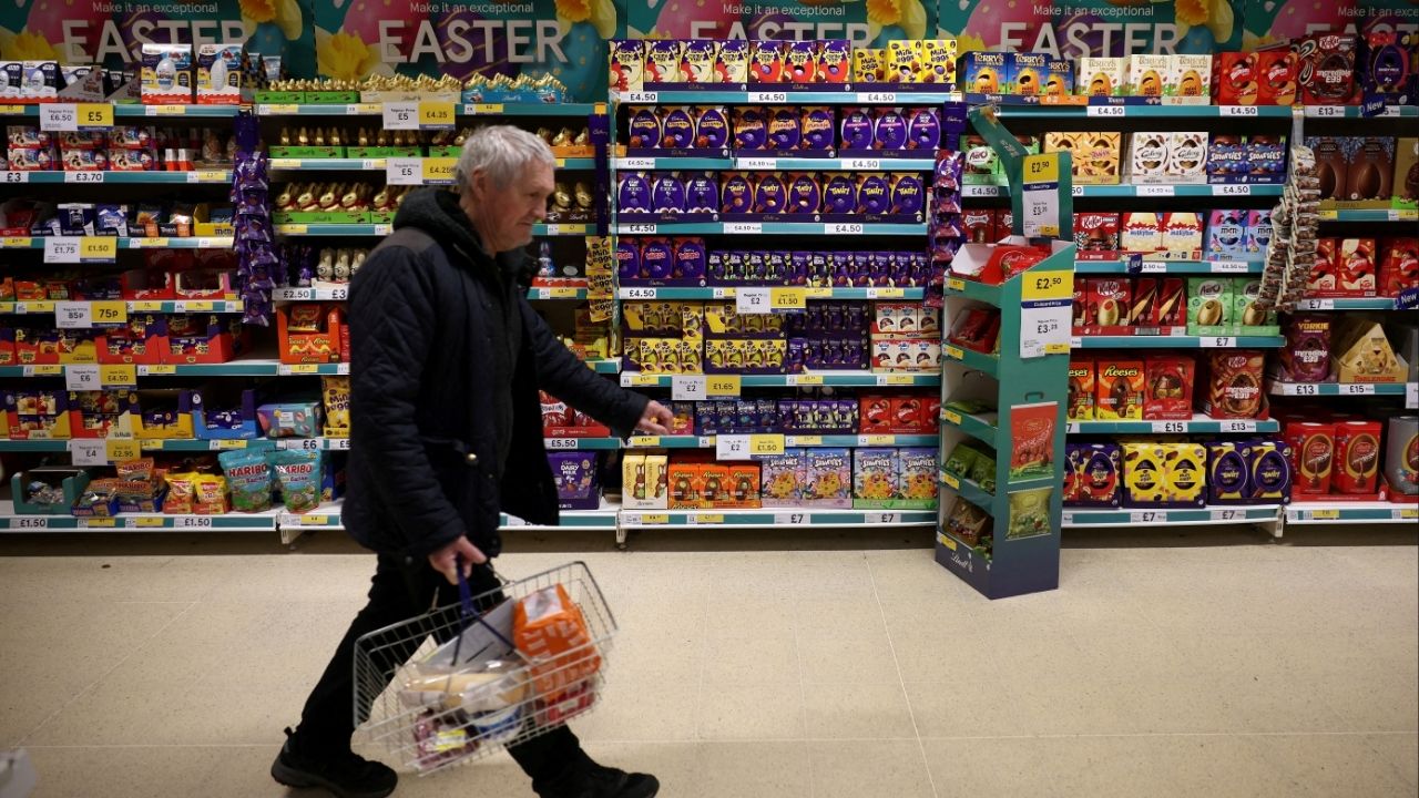 A shopper walks past shelves displaying easter eggs and chocolates inside a Tesco supermarket in Manchester, Britain, February 5, 2026. (Reuters File)