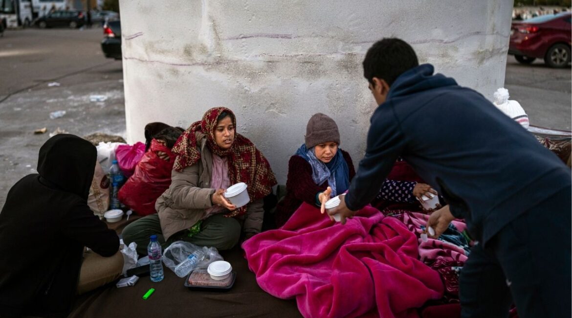 A volunteer, right, delivers meals to migrant domestic workers who fled to Beirut, Lebanon, from the southern suburbs on Friday, March 6, 2026. The Israeli military pounded Beirut with airstrikes on Friday and issued more evacuation warnings in southern Lebanon as it intensified its campaign against Iran-backed Hezbollah militants. (Diego Ibarra Sanchez/The new York Times)