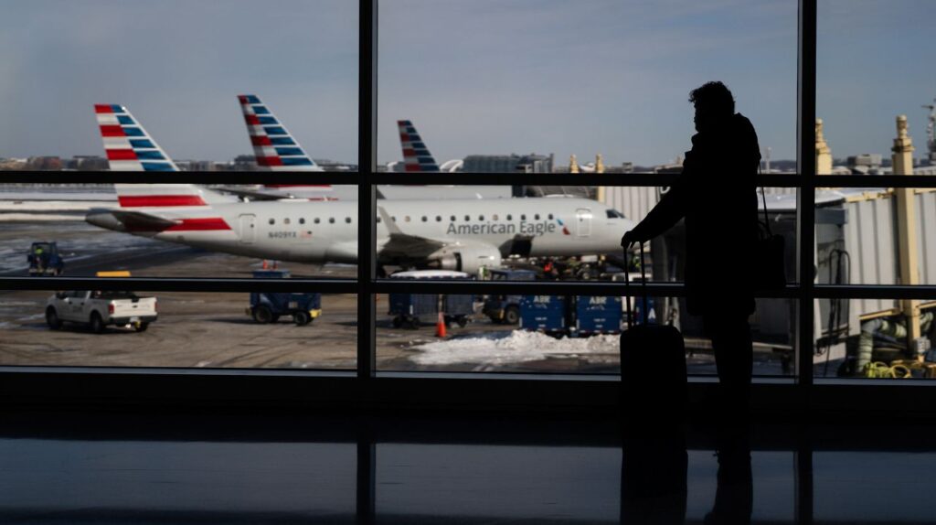 Image of travelers walking through Reagan National Airport in Arlington, Virginia