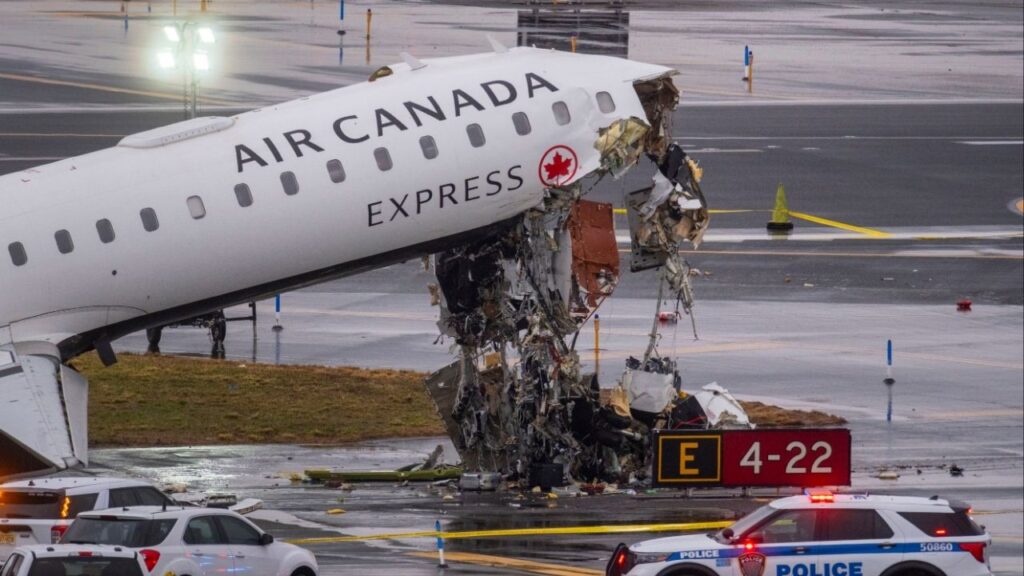 An Air Canada regional jet that collided with a Port Authority fire truck at LaGuardia Airport in Queens, on Monday, March 23, 2026. A runway collision at New York’s LaGuardia Airport late Sunday killed two people, injured dozens more and shut down one of the busiest domestic airports in the region. (Dakota Santiago/The New York Times)