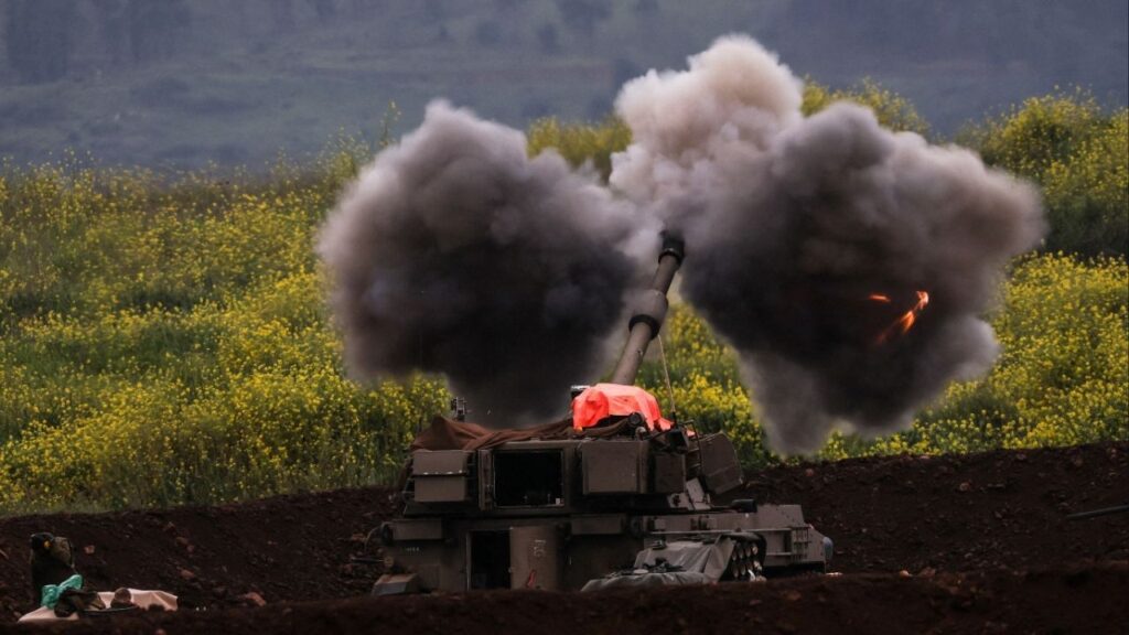 An Israeli artillery unit fires, amid escalation between Hezbollah and Israel, and amid the U.S.-Israeli conflict with Iran, on the Israeli side of the Israel-Lebanon border, March 15, 2026. (Reuters/Shir Torem)