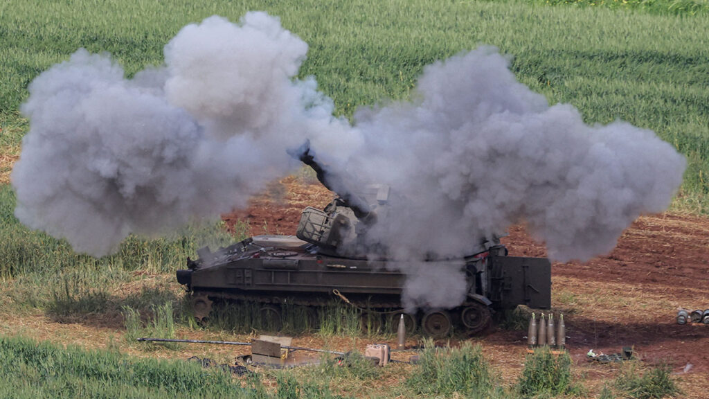 An Israeli artillery unit fires towards Lebanon, amid escalating hostilities between Israel and Hezbollah, as the U.S.-Israeli conflict with Iran continues, in northern Israel, March 26, 2026.