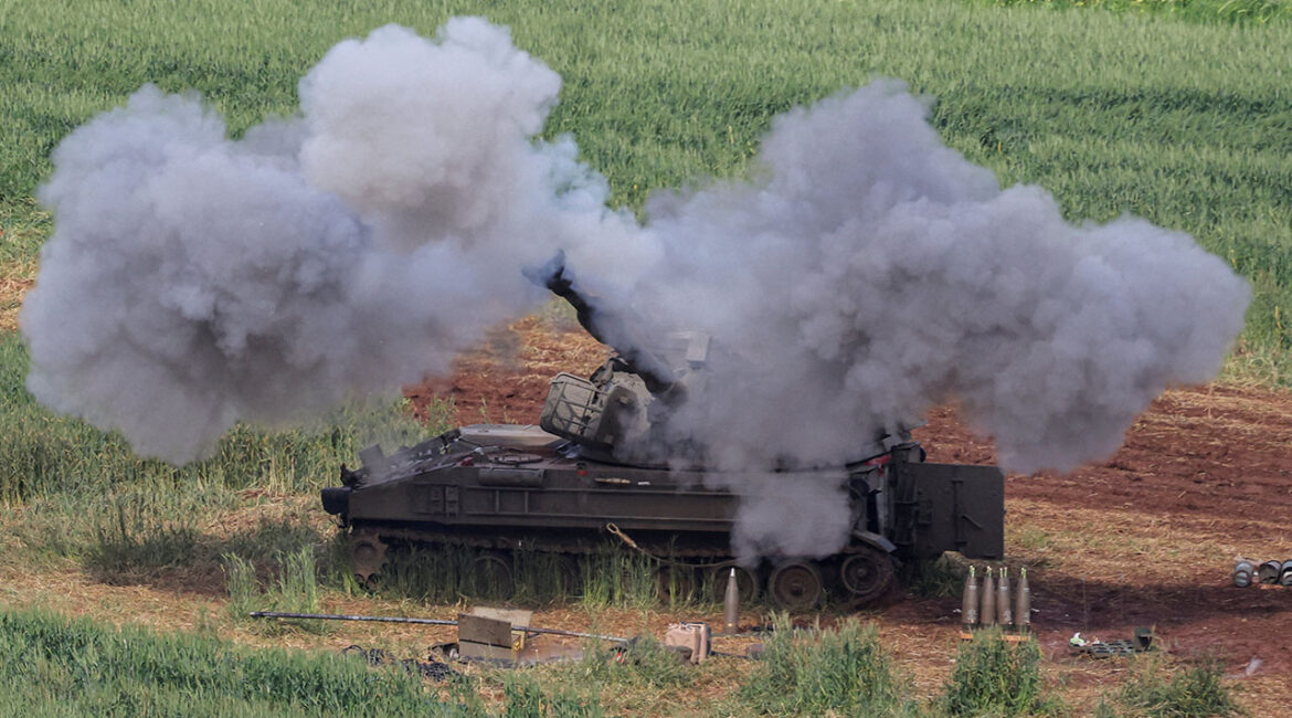 An Israeli artillery unit fires towards Lebanon, amid escalating hostilities between Israel and Hezbollah, as the U.S.-Israeli conflict with Iran continues, in northern Israel, March 26, 2026.