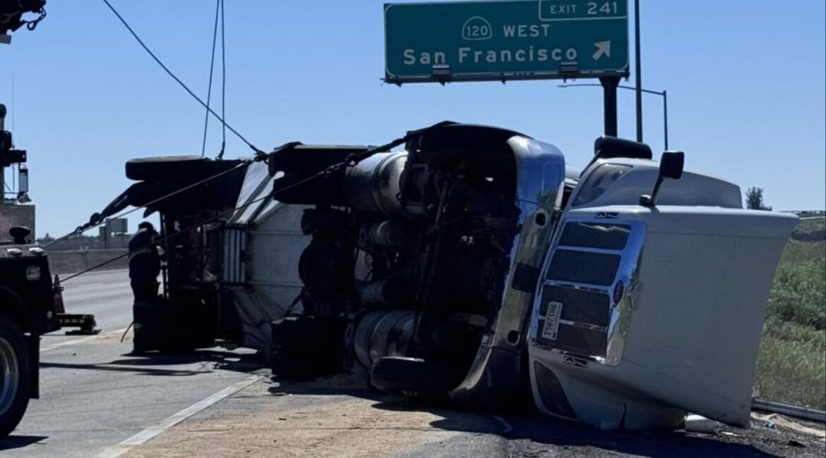 An overturned semi-truck reduced southbound Highway 99 to one lane near Manteca, causing major delays Thursday, March 19, 2026. (CHP)