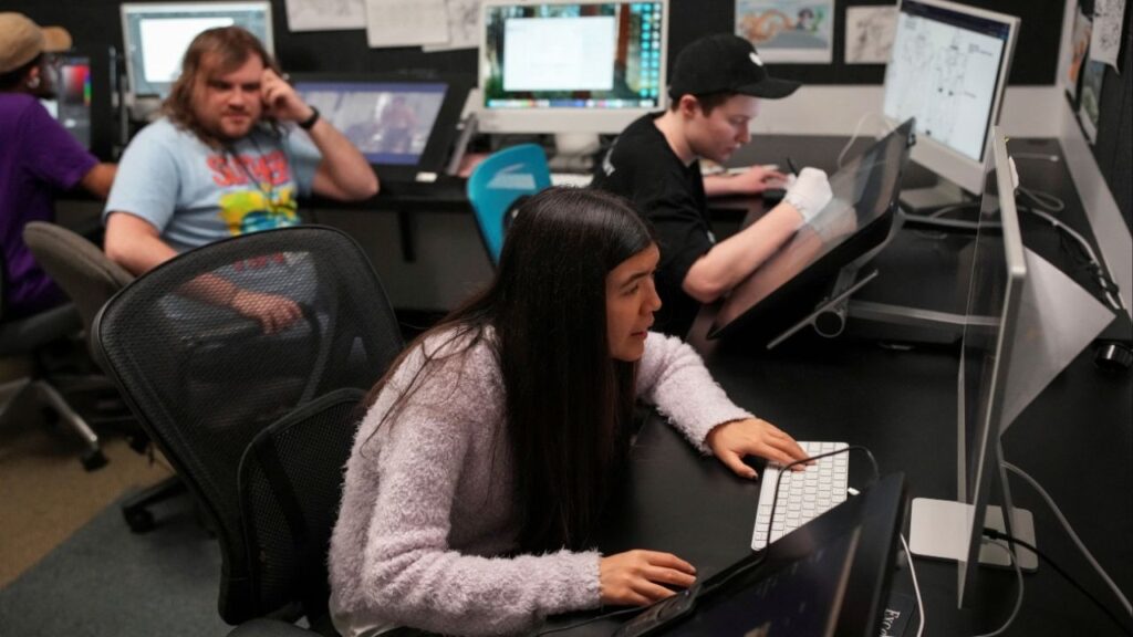 Animation Artist Lily Yllescas works on a computer at the Exceptional Minds Academy in Sherman Oaks, Los Angeles, California, U.S., January 28, 2026. (Reuters/Daniel Cole)