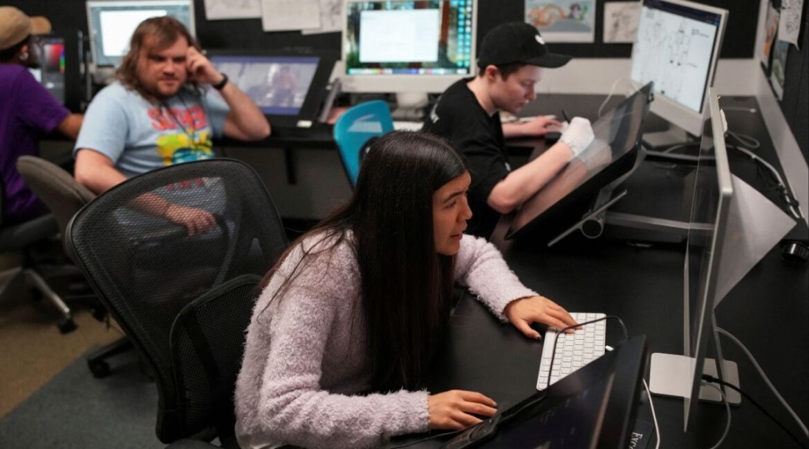 Animation Artist Lily Yllescas works on a computer at the Exceptional Minds Academy in Sherman Oaks, Los Angeles, California, U.S., January 28, 2026. (Reuters/Daniel Cole)