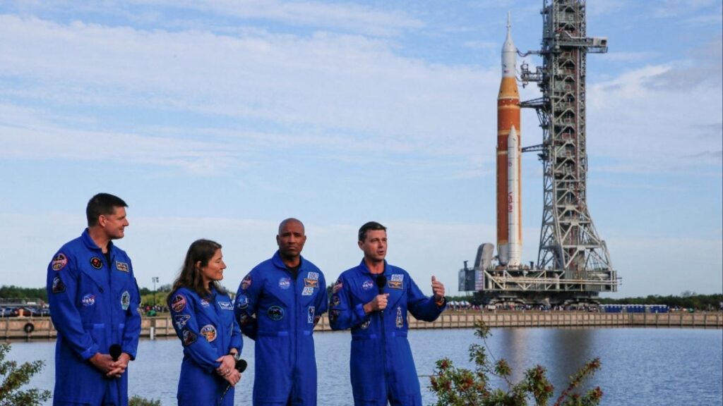 Artemis II mission's Commander Reid Wiseman speaks next to pilot Victor Glover, mission specialists Christina Koch and Jeremy Hansen during the rollout of NASA's next-generation moon rocket, the Space Launch System (SLS) rocket with the Orion crew capsule, to the launch pad at the Kennedy Space Center in Cape Canaveral, Florida, U.S., January 17, 2026. (Reuters/Joe Skipper)