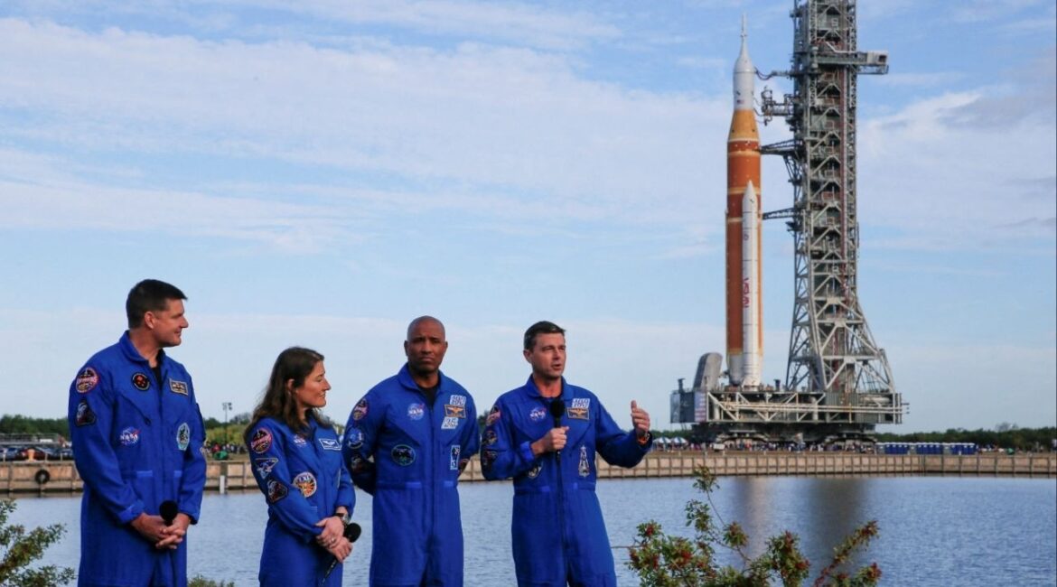 Artemis II mission's Commander Reid Wiseman speaks next to pilot Victor Glover, mission specialists Christina Koch and Jeremy Hansen during the rollout of NASA's next-generation moon rocket, the Space Launch System (SLS) rocket with the Orion crew capsule, to the launch pad at the Kennedy Space Center in Cape Canaveral, Florida, U.S., January 17, 2026. (Reuters/Joe Skipper)