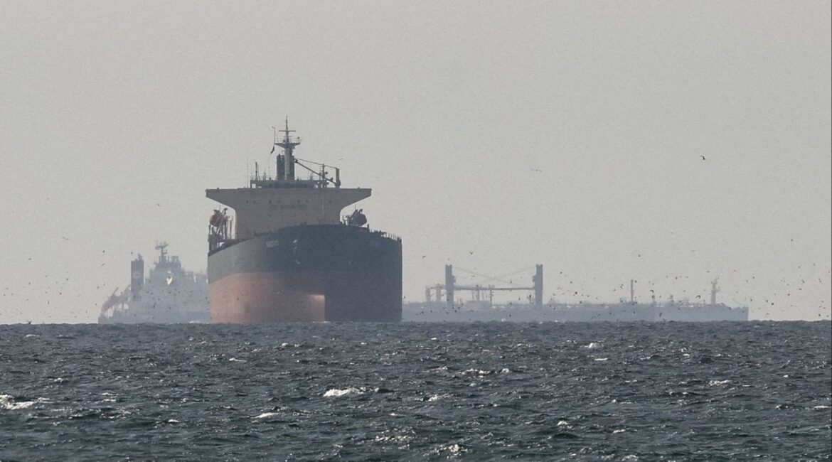 Cargo ships in the Gulf, near the Strait of Hormuz, as seen from northern Ras al-Khaimah, near the border with Oman’s Musandam governance, amid the U.S.-Israeli conflict with Iran, in United Arab Emirates, March 11, 2026. (Reuters File)