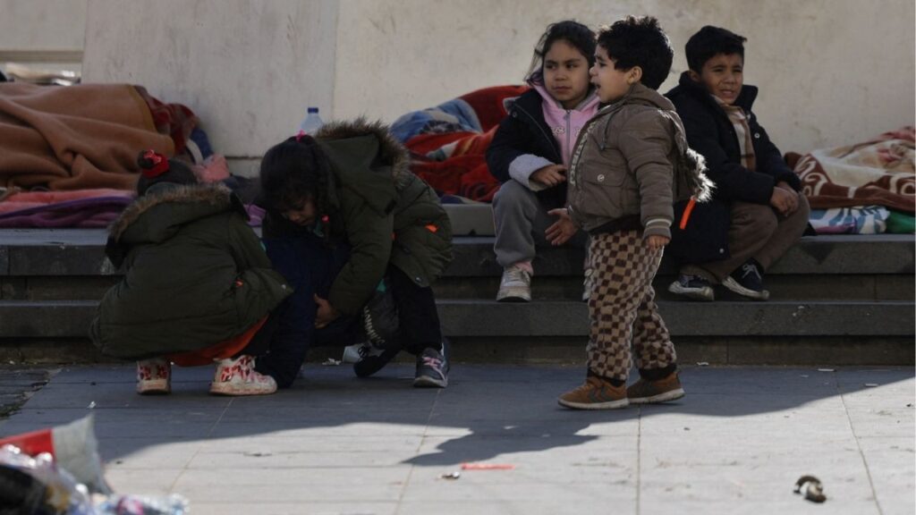 Children displaced from the southern suburbs of Beirut after the Israeli army's warning prompted residents to evacuate, following an escalation between Hezbollah and Israel amid the U.S.-Israeli conflict with Iran, rest at Martyrs' Square in Beirut, Lebanon, March 6, 2026. (Reuters/Khalil Ashawi)