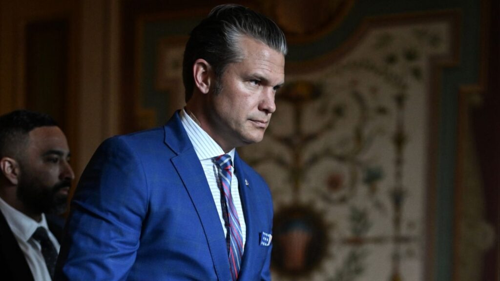 Defense Secretary Pete Hegseth at the Capitol in Washington, Jan. 7, 2026. At a news conference on Friday, March 13, Hegseth gave no indication of how long it would take before the Navy could escort civilian cargo ships through the Strait of Hormuz. (Kenny Holston/The New York Times)