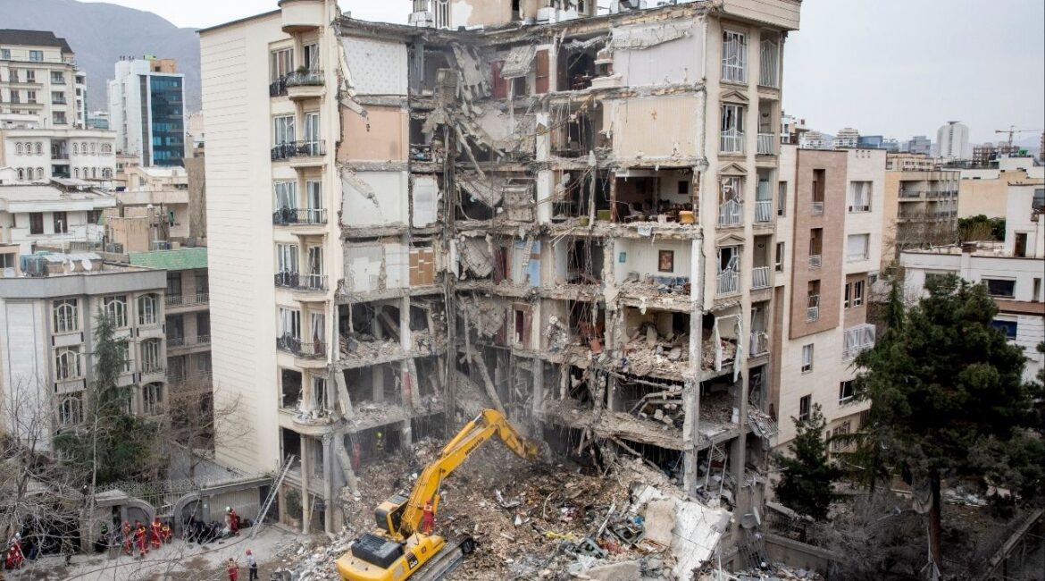 Emergency workers at a residential building that was the site of an airstrike in Tehran, on Monday, March 23, 2026. Saudi Arabia’s de facto leader, Prince Mohammed bin Salman, has been pushing Trump to continue the war against Iran, arguing that the campaign presents a “historic opportunity” to remake the Middle East. (Arash Khamooshi/The New York Times)