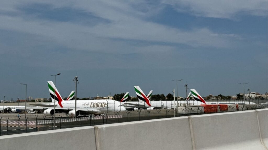 Emirates' planes sit on the tarmac of Dubai International Airport (DXB) after two drones came down in the vicinity of the airport, amid the U.S.-Israeli conflict with Iran, in Dubai, United Arab Emirates, March 11, 2026. Picture taken with a mobile phone. REUTERS/Stringer