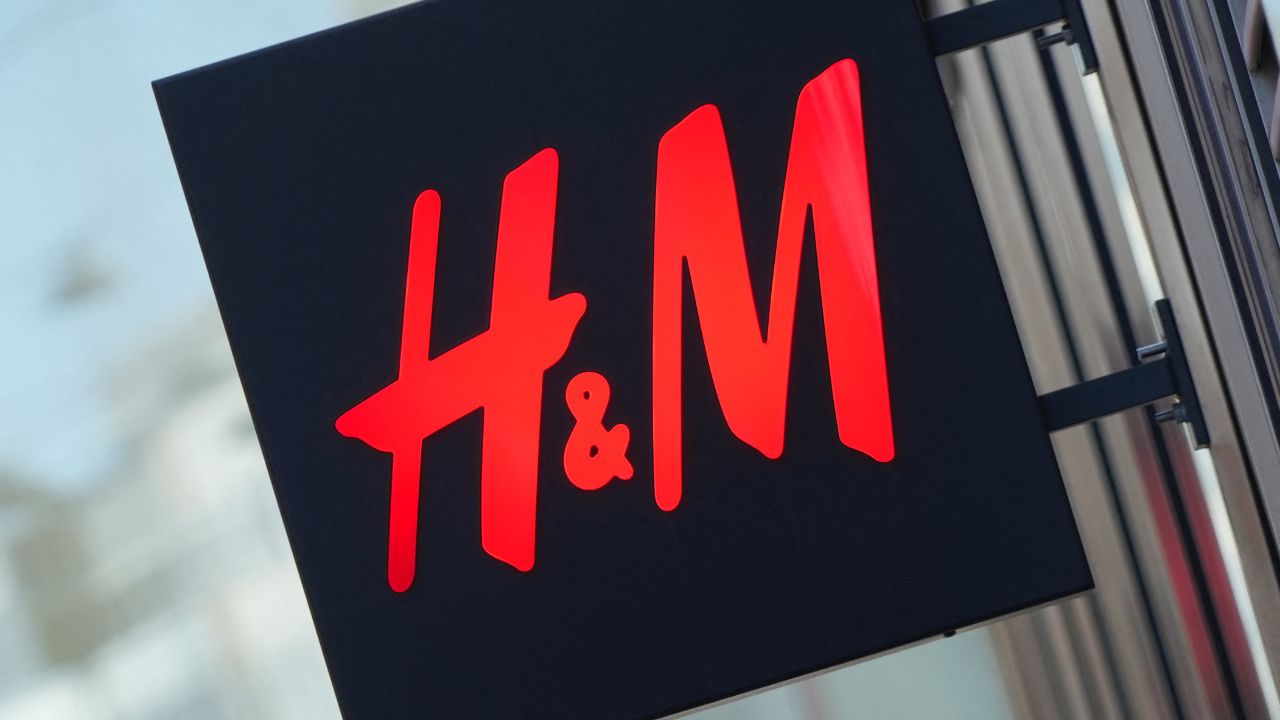 The logo for H&M is displayed outside a store in Stockholm, Sweden, September 23, 2025. (Reuters/Tom Little)