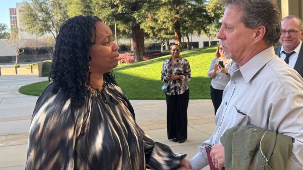 Image of La-Kebbia “Kiki” Wilson and Charles Smith outside the federal courthouse in Fresno