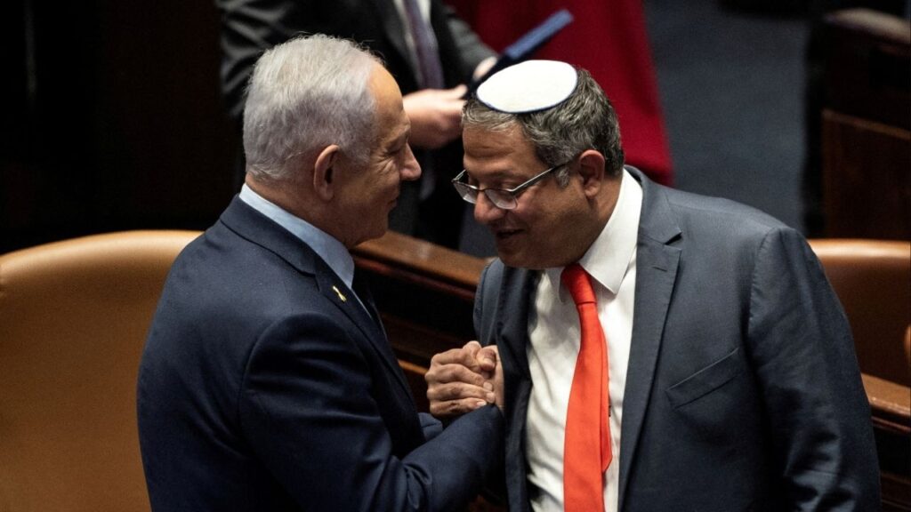 Israel Prime minister Benjamin Netanyahu and Itamar Ben Gvir shake hands as the Israeli government approve Netanyahu's proposal to reappoint Itamar Ben-Gvir as minister of National Security, in the Knesset, Israeli parliament in Jerusaelm, March 19, 2025 (Reuters/Oren Ben Hakoon)