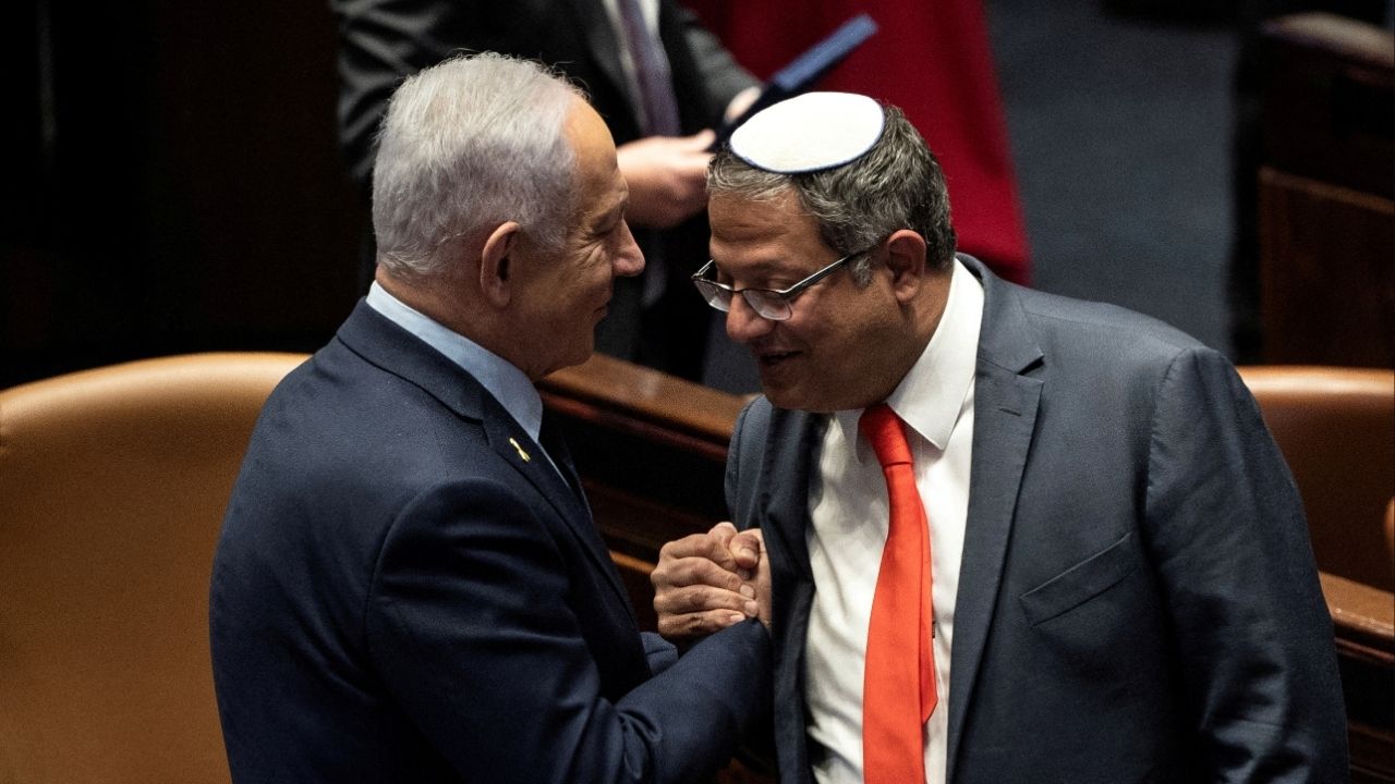 Israel Prime minister Benjamin Netanyahu and Itamar Ben Gvir shake hands as the Israeli government approve Netanyahu's proposal to reappoint Itamar Ben-Gvir as minister of National Security, in the Knesset, Israeli parliament in Jerusaelm, March 19, 2025 (Reuters/Oren Ben Hakoon)