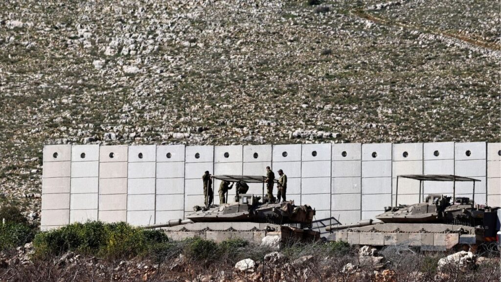 Israeli soldiers work on their tank on the Israeli side of the Israel-Lebanon border, amid escalation between Hezbollah and Israel, and amid the U.S.-Israeli conflict with Iran, in northern Israel, March 10, 2026. (Reuters File)