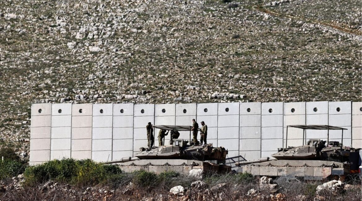 Israeli soldiers work on their tank on the Israeli side of the Israel-Lebanon border, amid escalation between Hezbollah and Israel, and amid the U.S.-Israeli conflict with Iran, in northern Israel, March 10, 2026. (Reuters File)