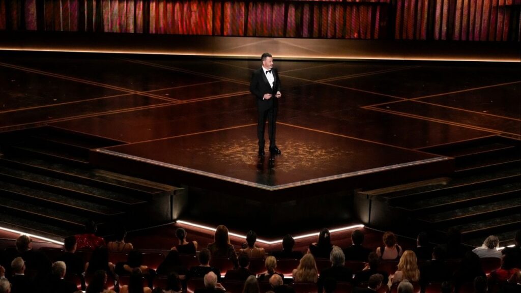 Jimmy Kimmel presents the award for best documentary short film during the 98th Academy Awards at the Dolby Theatre in Los Angeles, March 15, 2026. Kimmel delivered one of the sharpest political jokes of Oscars night while introducing the documentary awards. (Philip Cheung/The New York Times)