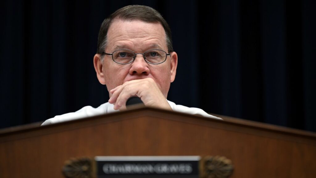 Image of Rep. Sam Graves peering over his microphone during a hearing