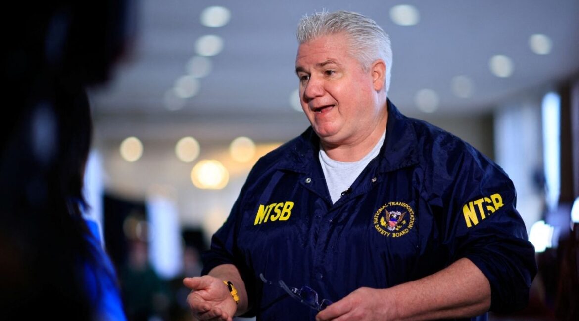 Member of the National Transportation Safety Board (NTSB) J. Todd Inman speaks with a journalist, in the aftermath of the collision of American Eagle flight 5342 and a Black Hawk helicopter that crashed into the Potomac River, at Ronald Reagan Washington National Airport, in Arlington, Virginia, U.S., January 31, 2025. (Reuters/Eduardo Munoz)