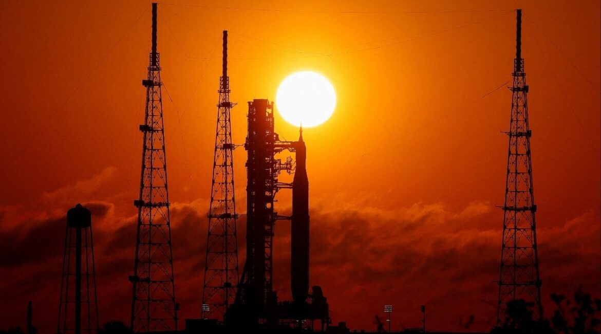 NASA's next-generation moon rocket, the Space Launch System (SLS) rocket with the Orion crew capsule, on launch pad 39B as the sun rises at the Kennedy Space Center in Cape Canaveral, Florida, U.S., March 24, 2026. (Reuters/Joe Skipper)
