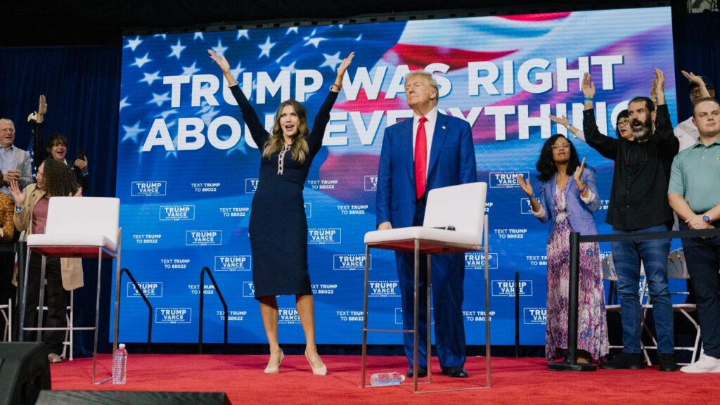 Image of Kristi Noem and Donald Trump at a 2024 campaign rally.