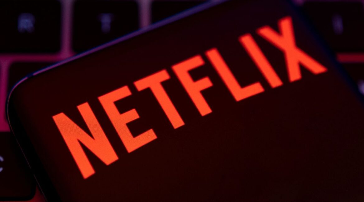 Smartphone with Netflix logo is placed on a keyboard in this illustration taken April 19, 2022. (Reuters/Dado Ruvic)