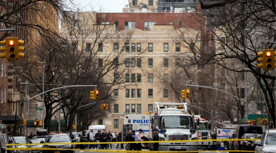 New York Police Department bomb squad officers near Gracie Mansion, the official residence of Mayor Zohran Mamdani, in Manhattan on Sunday, March 8, 2026. The sight of a man igniting a homemade bomb then hurling it into a crowd of protesters stunned people in New York City, where no one has attempted to use an explosive device in a public place for nine years. (Vincent Alban/The New York Times)